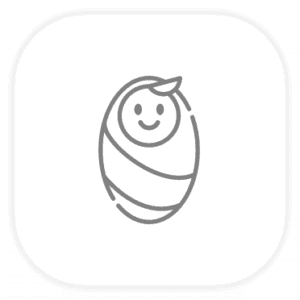 Smiling baby wrapped in a cozy swaddle blanket for comfort and security.